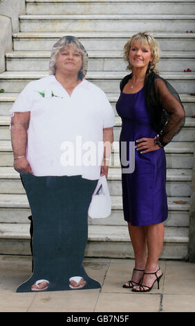 Mother-of-four Penny Melly stands next to a cardboard cut-out of her former self at the Ritz Hotel in London after being named Slimming World Woman of the Year. Stock Photo