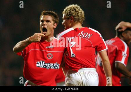 Charlton Athletic's Jonatan Johansson celebrates scoring the 2nd goal against Fulham with Scott Parker (l) Stock Photo