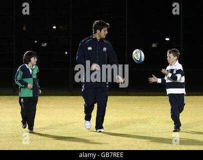 Scotland Rugby's Hugo Southwell passes with Craig Sheperd and Peter Thompson during the community day at the St Machar Academy Stock Photo