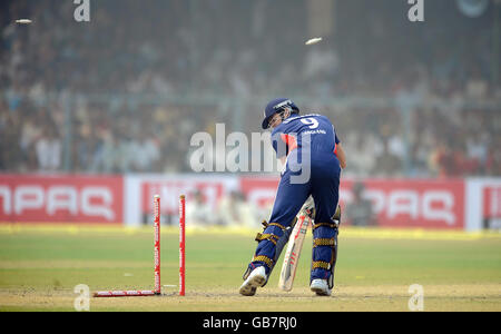 James Anderson is bowled out by Munaf Patel during the Third One Day International at the Green Park Stadium in Kanpur, India. Stock Photo