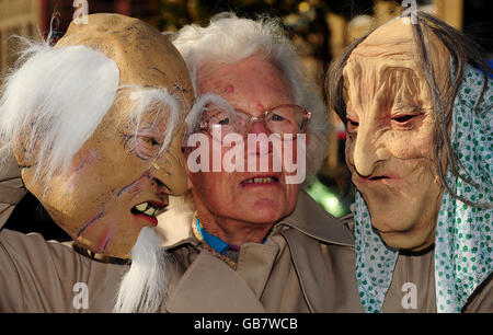 Erica Marston, 88, with two 'scary pensioner' masks on sale in Woolworthes, which have been condemned as 'deeply inappropriate' and discriminating against the elderly, by the politician Liz Lynne, Liberal Democrat MEP for the West Midlands, who said: 'Halloween is supposed to be a fun time, but I think that the singling out of older people by Woolworths as something to ridicule steps over the line.' A Woolworths spokesman defended the sales but offered an apology to anyone offended. Stock Photo