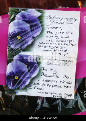 Tributes left by John and Toni Lappin with flowers at the scene where their son Joseph Lappin, 16, was stabbed to death outside a youth club in Everton on Monday night. Stock Photo