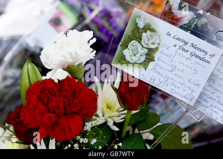 Tributes left at the scene where Joseph Lappin, 16, was stabbed to death outside a youth club in Everton on Monday night. Stock Photo