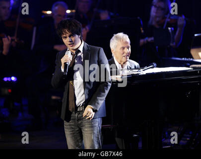 Jamie Cullum performing with Burt Bacharach and the BBC Concert Orchestra, to launch the BBC Electric Proms series, at the Roundhouse, Chalk Farm Road, north London. Stock Photo