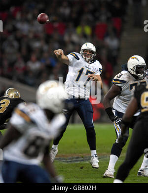 American Football - NFL - San Diego Chargers v New Orleans Saints - Wembley Stadium. San Diego Chargers Quarterback Philip Rivers attempts a throw during the NFL match at Wembley Stadium, London. Stock Photo