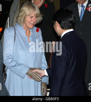 The Duchess of Cornwall, greets Crown Prince Naruhito of Japan as she arrives at Haneda Airport in Tokyo, for the start of a official 10-day tour of the Far East by the Prince of Wales and Camilla. Stock Photo