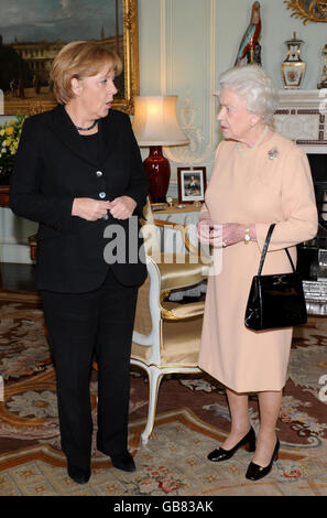 Britain's Queen Elizabeth II receives German Chancellor Angela Merkel at Buckingham Palace, London. Stock Photo