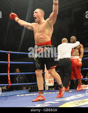Poland's Albert Sosnowski celebrates his knockout of British Heavyweight champion Danny Williams during the heavyweight match at York Hall, Bethnal Green, London. Stock Photo