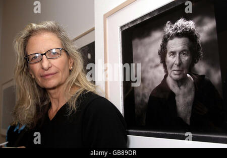 Photographer Annie Leibovitz next to her portrait of her mother, during the press launch of her exhibition 'Annie Leibovitz: A Photographer's Life 1990-2005', at the National Portrait Gallery in central London. Stock Photo