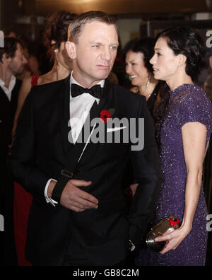 British actor Daniel Craig and his partner Satsuki Mitchell wait to meet Britain's Princes William and Harry at the world premiere of 'Quantum Of Solace' at the Odeon Leicester Square in central London. Stock Photo