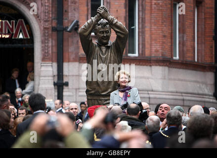 Barbara Clough stands with a statue of her late husband, Nottingham Forest's legendary manager Brian Clough, which she unveiled in the city's Old Market Square area today. Stock Photo