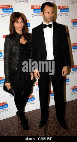 Manchester United's Ryan Giggs and partner arrives at Manchester United Football Club's 'United for UNICEF' gala dinner held at Old Trafford, Manchester. Stock Photo