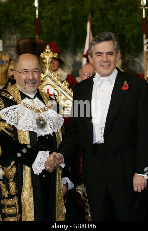 Prime Minister Gordon Brown shakes hands with The Lord Mayor of London, Alderman Ian Luder, during the Lord Mayor of London's banquet at the Guildhall in London. Stock Photo