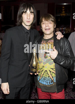 Primal Scream band members Bobby Gillespie (left) and Mani at the Armand de Brignac Champagne reception for the Classic Rock Roll of Honour Awards at the Park Lane Hotel, Piccadilly, London. Stock Photo