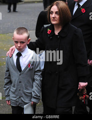 Michael Lappin and Toni Lappin brother and mother of murdered Joseph Lappin lead mourners from church after the funeral service for Joseph at St Oswald's Church, Old Swan, Liverpool. Stock Photo