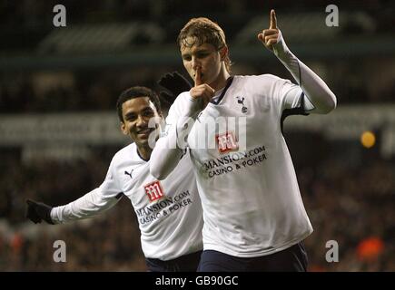 Tottenham Hotspur's Roman Pavlyuchenko (right) celebrates with team mate Aaron Lennon, after scoring the first goal of the game. Stock Photo