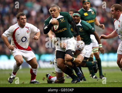 Rugby Union - Investec Challenge Series - England v South Africa - Twickenham. South Africa's Bryan Habana is tackled by James Haskell of England during the Investec Challenge Series match at Twickenham, London. Stock Photo