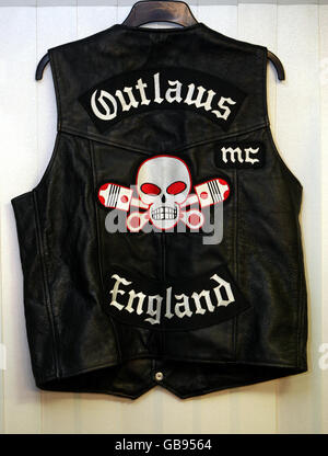 Previously unreleased photo of an 'Outlaw' biker's jacket shown by Warwickshire Police, which was among evidence collected during the prosecution of those accused of the murder of biker Gerry Tobin on the M40 motorway, on November 5. Stock Photo