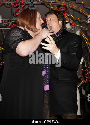 Sir Paul McCartney joins Peter Kay on stage for the switching on of the Christmas lights at Stella McCartney's store in Mayfair, central London. Stock Photo