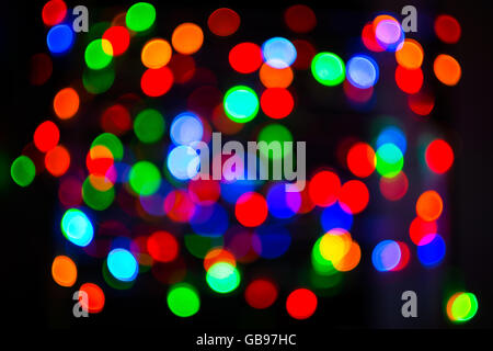 Holidays lights background. Bokeh background. Lightbulb background Stock Photo