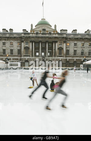 Children of all ages enjoy the first skate on the Somerset House ice rink for the launch of the Somerset House Skate School. Stock Photo