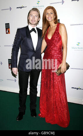 Host of the event Ronan Keating and his wife Yvonne arriving for his Emeralds and Ivy Ball in aid of Cancer Research UK, at Battersea Evolution in south London. Stock Photo