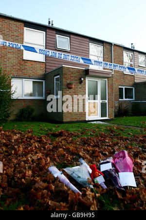 Flowers outside the house in New Ash Green, near Dartford in Kent, where the body of schoolboy James Taylor, was found by police early Tuesday morning. Stock Photo