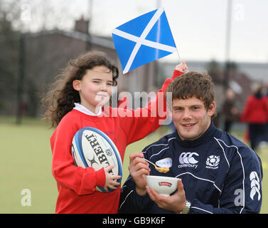 Scotland's Ross Ford poses with Nicole Gray (10) during the community day at Kintore Primary School Stock Photo