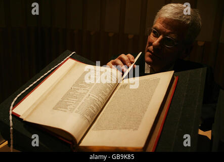 The British Library's Head of British Collections, Dr Kristian Jensen, pointing out the theft of several pages from the libray's copy of 'Novus Orbis Rgionum', dating from 1537 and valued at 32,000, a crime admitted to by businessman Farhad Hakimzadeh, 60, inside the British Library in central London. Stock Photo