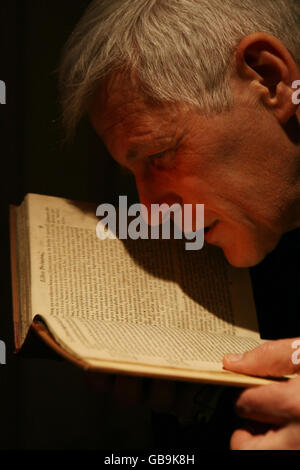 The British Library's Head of British Collections, Dr Kristian Jensen, observing the loss of several pages from the libray's copy of 'Istoria de la China', dating from 1621 and valued at 13,500, the theft admitted to by businessman Farhad Hakimzadeh, 60, inside the British Library in central London. Stock Photo