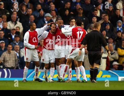 Arsenal's Fredrik Ljungberg celebrates with team-mates after scoring the opening goal against Birmingham City Stock Photo