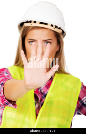 Worker woman making stop sign Stock Photo