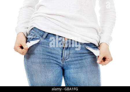 Young woman with empty pockets Stock Photo