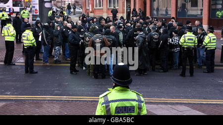 Police and supporters of the Outlaws gang outside Birmingham Crown Court, as seven members of the Outlaws motorcycle gang were jailed today for life for murdering Hell's Angel Gerry Tobin, 35. Stock Photo