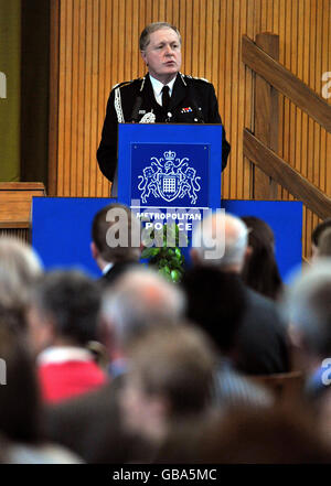 Metropolitan Police Commissioner Sir Ian Blair performs his last duty, as he makes a speech at a police long service award ceremony at Hendon Police College in London. Stock Photo