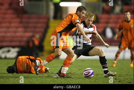 Soccer - Coca Cola League Two - Darlington v Barnet - Darlington Arena - Darlington. Darlington's Richard Ravenhill and Barnet's Michael Leary (centre) during the Coca-Cola League Two match at Darlington Arena, Darlington. Stock Photo