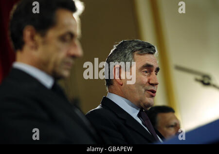 French President Nicolas Sarkozy, British Prime Minister Gordon Brown and European Commission President Jose Manuel Barroso attend a press conference following a Global Europe Summit with business leaders at Lancaster House in London. Stock Photo
