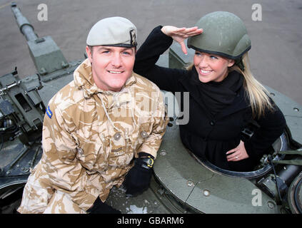 Corporal John Horn, an operator on a challenger tank from the Royal Scots Dragoon Guards, with Fiance Laura Mcgee at the Wessex Barracks in Bad Fallingbostel, Germany, after returning from Iraq. Stock Photo