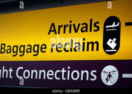 Arrivals, Baggage Reclaim sign Heathrow airport uk Stock Photo - Alamy