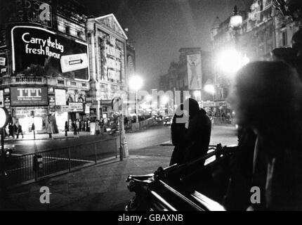 One of the regular power cuts takes out most of the lights in London's Piccadilly Circus. Stock Photo