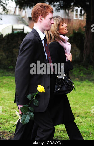 Mourners arrive for the funerals of businessman Christopher Foster's wife Jill Foster and daughter Kirstie Foster at St John's Church, Maesbrook, Shropshire. Stock Photo