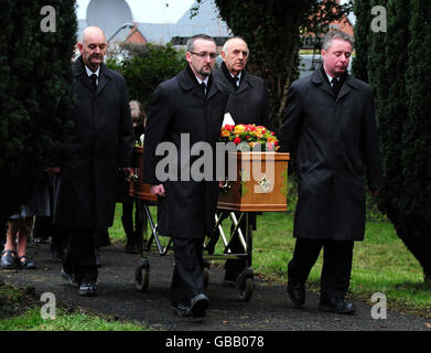 The coffin of businessman Christopher Foster is taken into church for his funeral at St John's Church, Maesbrook, Shropshire. Stock Photo