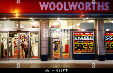 A cleaner at Woolworths in Ashford, Kent, before opening time, as the company struggles to find a buyer for its chain of stores. Stock Photo