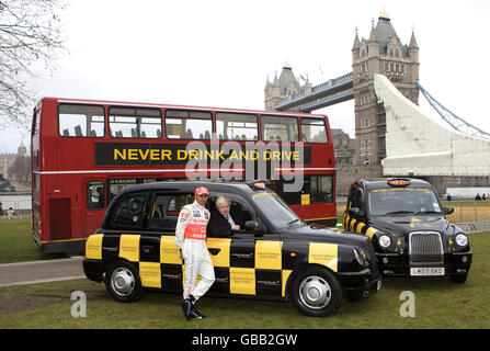 Current Formula 1 World Champion Lewis Hamilton (left) joins Mayor of London Boris Johnson in backing an anti-drink-drive campaign at Potters Fields Park in London. Stock Photo