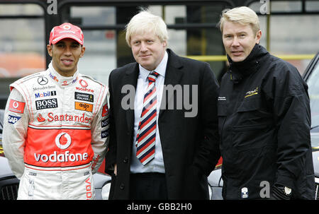 Retired Formula 1 World Champion Mika Hakkinen (right) and current Formula 1 World Champion Lewis Hamilton (left) join Mayor of London Boris Johnson in backing an anti-drink-drive campaign at Potters Fields Park in London. Stock Photo