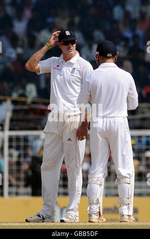 England's Kevin Pietersen speaks with Matt Prior during the fifth day of the First Test Match at the M. A. Chidambaram Stadium in Chennai, India. Stock Photo