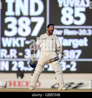 India's Yuvraj Singh celebrates after India win the match during the fifth day of the First Test Match at the M. A. Chidambaram Stadium in Chennai, India. Stock Photo