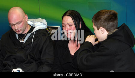 (left to right) Kieron Bimpson, Eleanor Skelhorne and their son Kieron appeal for information regarding the arson attack on their home which claimed the life of their daughter Francesca in Liverpool. Stock Photo