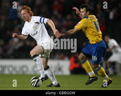 Milton Keynes Dons' Dean Lewington (left) turns away from Southend United's Dougie Freedman during the Coca-Cola League One match at Stadium:MK, Milton Keynes. Stock Photo