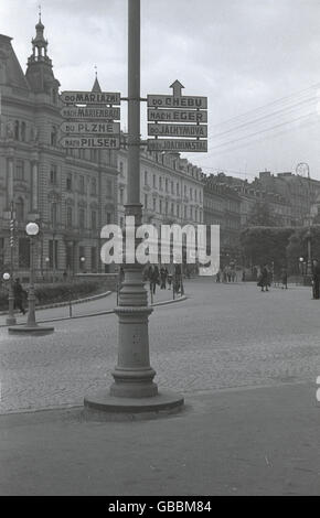 1930s, historical, town lamp post, Karlsbad, with place names, Sudetenland, pre-WW11 Czechoslovakia. Stock Photo